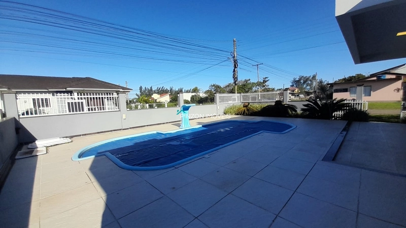 BELA CASA DE ESQUINA COM PISCINA AQUECIDA EM ARROIO DO SAL...: 10ª foto da galeria de imagens do imóvel