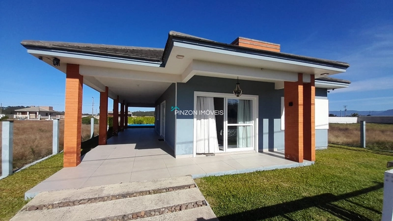 CASA QUE REÚNE CONFORTO E QUALIDADE DE VIDA EM ARROIO DO SAL: 1ª foto da galeria de imagens do imóvel