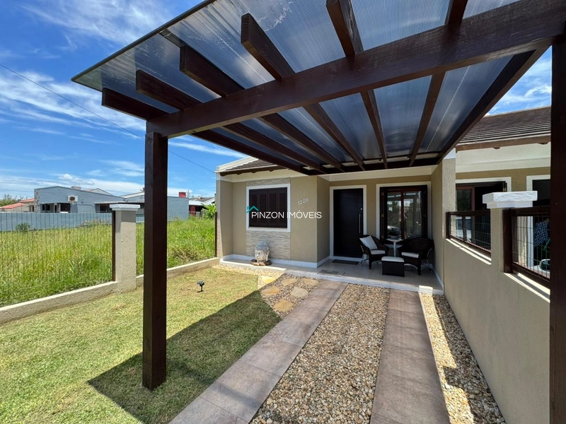 CASA GEMINADA EM ATLÂNTIDA SUL: 2ª foto da galeria de imagens do imóvel