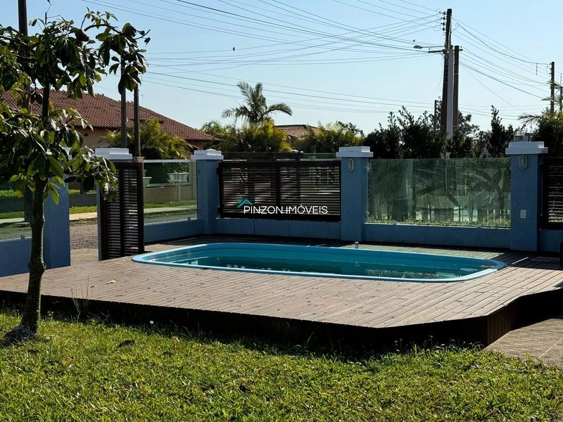 CASA COM PISCINA EM XANGRI-LÁ: 5ª foto da galeria de imagens do imóvel