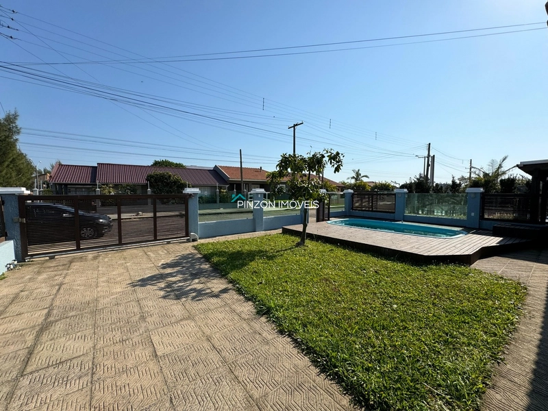 CASA COM PISCINA EM XANGRI-LÁ: 4ª foto da galeria de imagens do imóvel