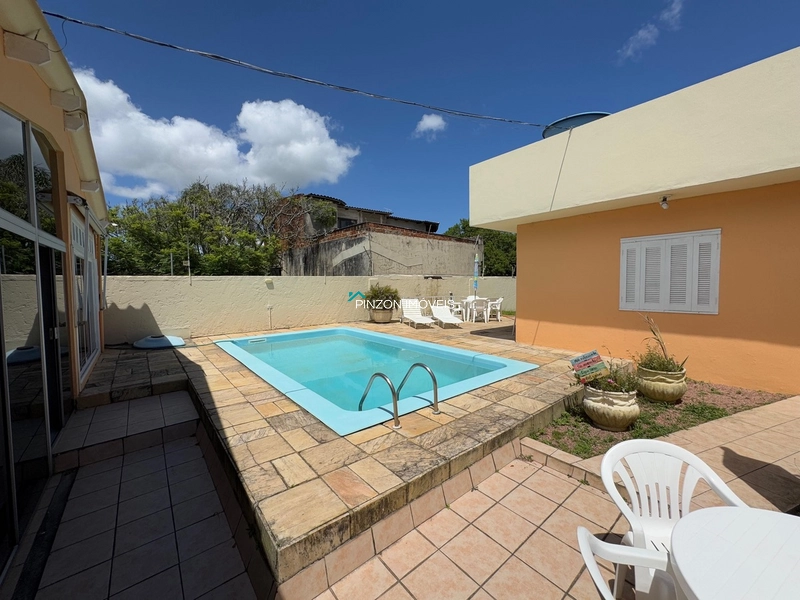 CASA COM PISCINA E DOIS TERRENOS.: 5ª foto da galeria de imagens do imóvel