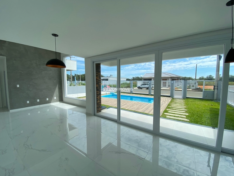 CASA COM PISCINA EM ARROIO DO SAL: 7ª foto da galeria de imagens do imóvel