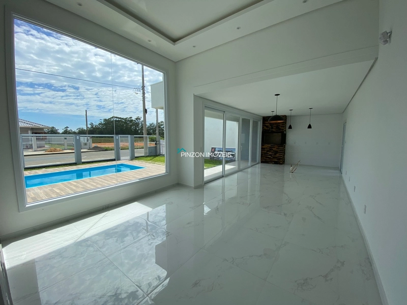 CASA COM PISCINA EM ARROIO DO SAL: 5ª foto da galeria de imagens do imóvel