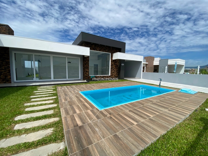 CASA COM PISCINA EM ARROIO DO SAL: 2ª foto da galeria de imagens do imóvel