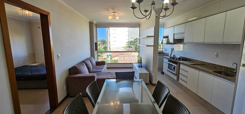APARTAMENTO NO CENTRO DE ARROIO DO SAL: 3ª foto da galeria de imagens do imóvel