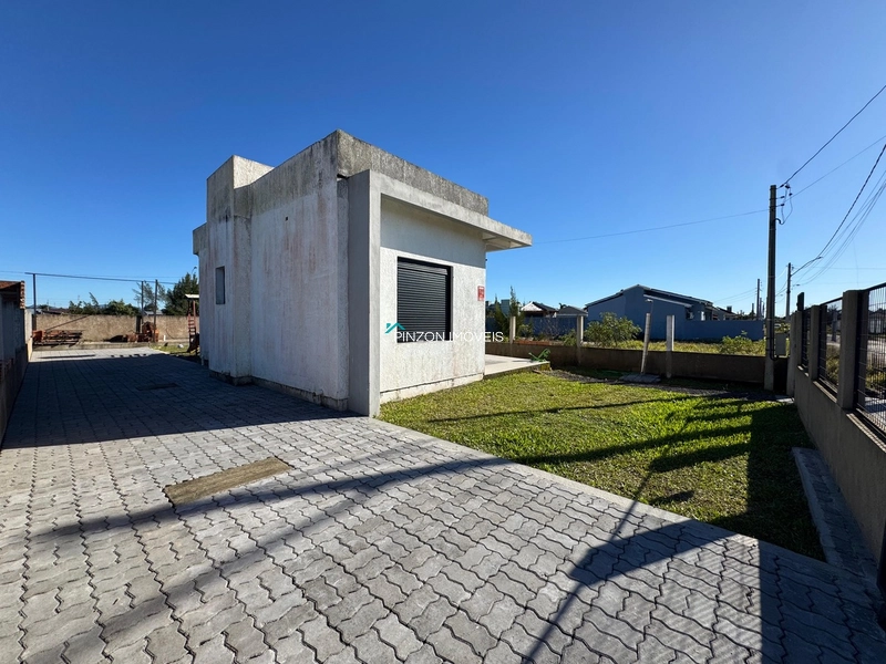 Casa em Atlântida Sul: 3ª foto da galeria de imagens do imóvel