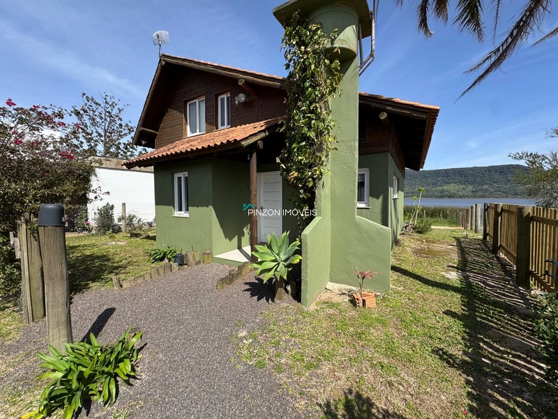 CASA NA BEIRA DA LAGOA: 4ª foto da galeria de imagens do imóvel