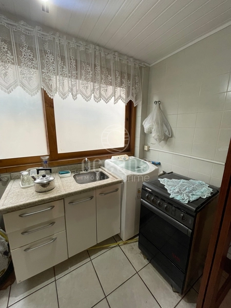 APARTAMENTO NO CENTRO DE CAPÃO DA CANOA: 2ª foto da galeria de imagens do imóvel