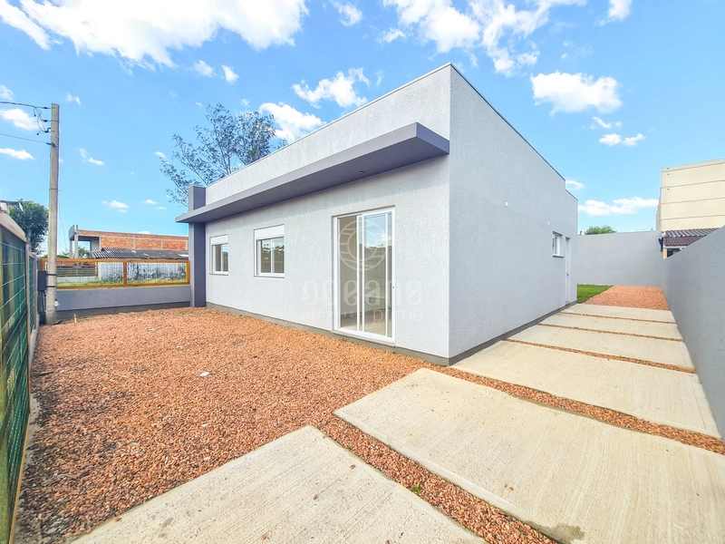 CASA 3 DORMITÓRIOS - TERRENO INTEIRO