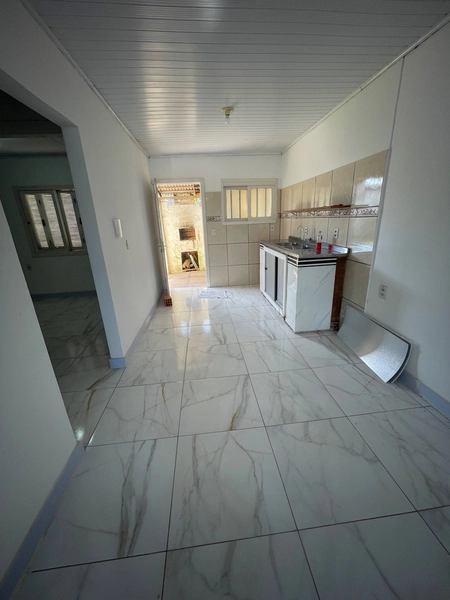 CASA COM 3 DORMITÓRIOS E TERRENO INTEIRO EM CAPÃO NOVO: 5ª foto da galeria de imagens do imóvel