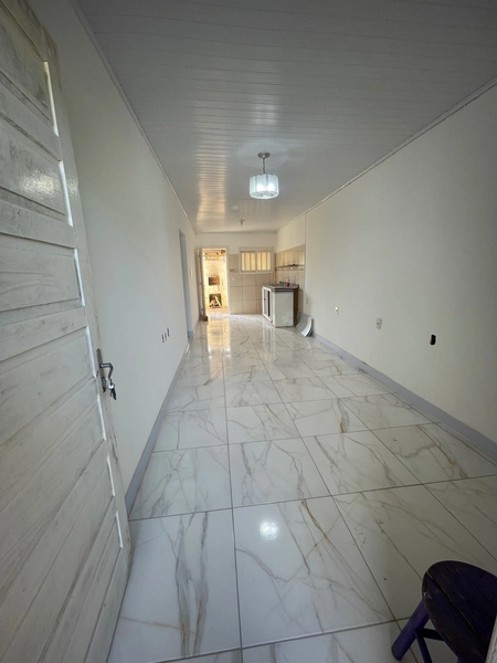 CASA COM 3 DORMITÓRIOS E TERRENO INTEIRO EM CAPÃO NOVO: 4ª foto da galeria de imagens do imóvel