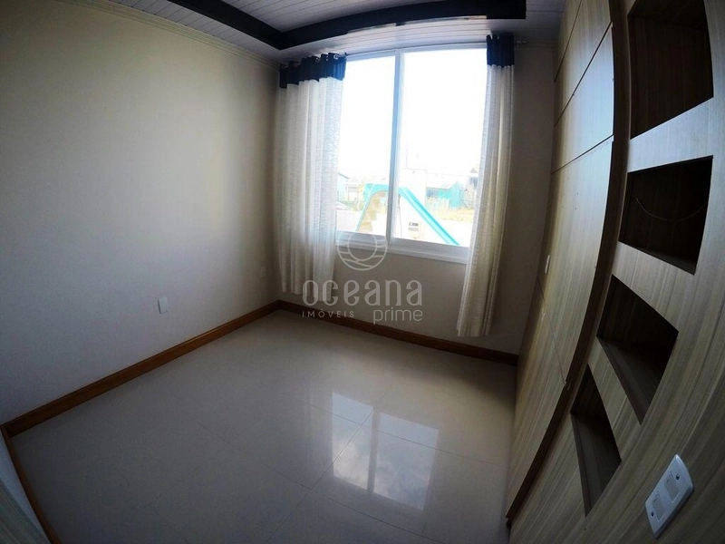 CASA A VENDA UMA QUADRA DO MAR EM CAPAO DA CANOA: 3ª foto da galeria de imagens do imóvel