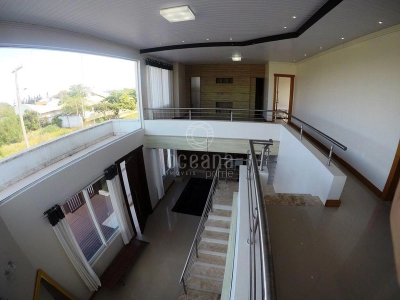 CASA A VENDA UMA QUADRA DO MAR EM CAPAO DA CANOA: 4ª foto da galeria de imagens do imóvel