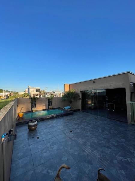 CASA DE ALTO PADRÃO EM CAPÃO NOVO: 3ª foto da galeria de imagens do imóvel