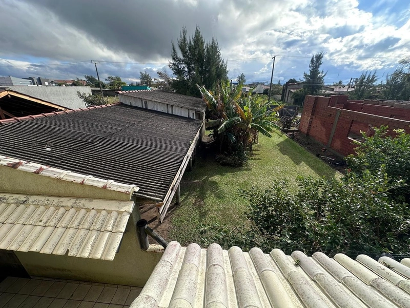 CASA A VENDA EM XANGRI-LÁ COM DOIS TERRENOS: 7ª foto da galeria de imagens do imóvel
