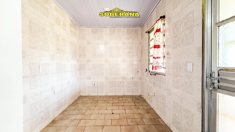 TERRENO COM DUAS BOAS CASAS NO PÁTIO EM CAPÃO NOVO: 3ª foto da galeria de imagens do imóvel