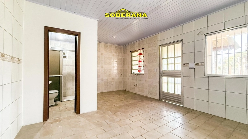 TERRENO COM DUAS BOAS CASAS NO PÁTIO EM CAPÃO NOVO: 4ª foto da galeria de imagens do imóvel