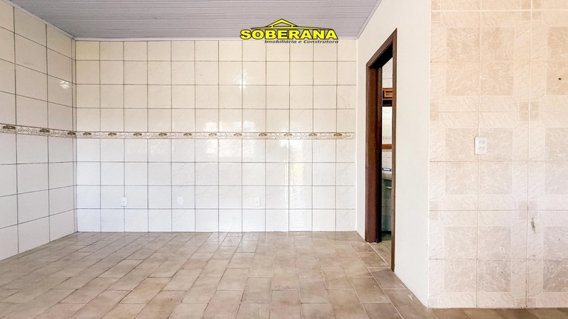 TERRENO COM DUAS BOAS CASAS NO PÁTIO EM CAPÃO NOVO: 8ª foto da galeria de imagens do imóvel