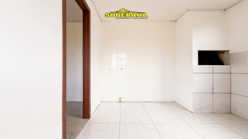 TERRENO COM DUAS BOAS CASAS NO PÁTIO EM CAPÃO NOVO: 11ª foto da galeria de imagens do imóvel