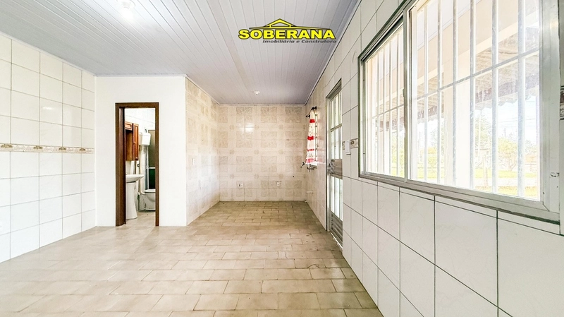 TERRENO COM DUAS BOAS CASAS NO PÁTIO EM CAPÃO NOVO: 5ª foto da galeria de imagens do imóvel