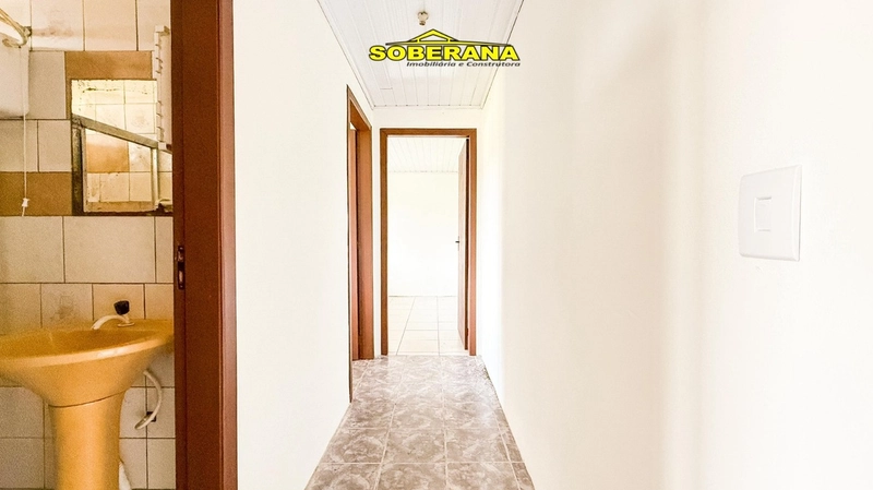 TERRENO COM DUAS BOAS CASAS NO PÁTIO EM CAPÃO NOVO: 17ª foto da galeria de imagens do imóvel