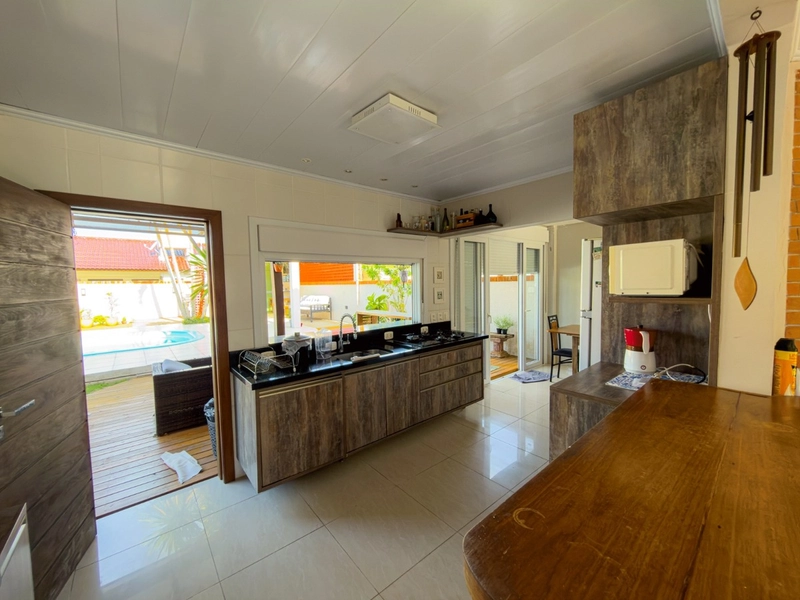 CASA 4 DORMITÓRIOS COM 2 SUÍTES | ATLÂNTIDA - 900 METROS DO MAR: 13ª foto da galeria de imagens do imóvel