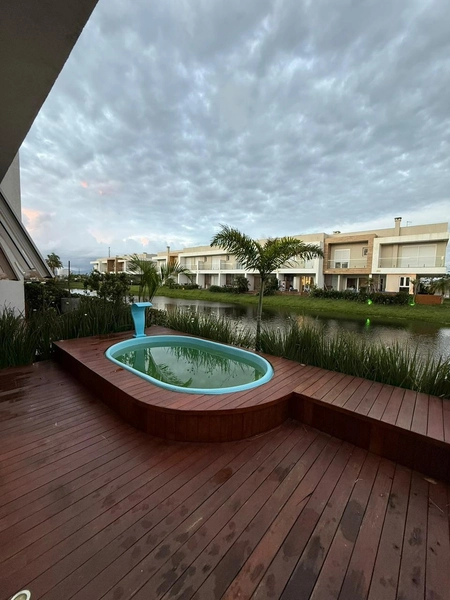 CASA EM CONDOMÍNIO - 3 DORMITÓRIOS COM PISCINA / BEIRA LAGO: 1ª foto da galeria de imagens do imóvel