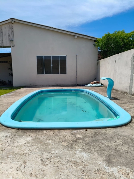 CASA DE ESQUINA COM PISCINA EM CAPÃO NOVO: 4ª foto da galeria de imagens do imóvel