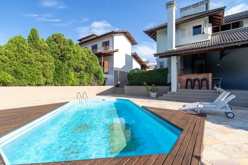 Casa em Cacupé  em Condomínio fechado com 3 quartos 1 suíte e 2 vagas: 1ª foto da galeria de imagens do imóvel