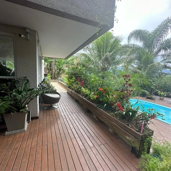 Casa em condomínio fechado em Cacupé com 4 suítes - 700 m²: 3ª foto da galeria de imagens do imóvel