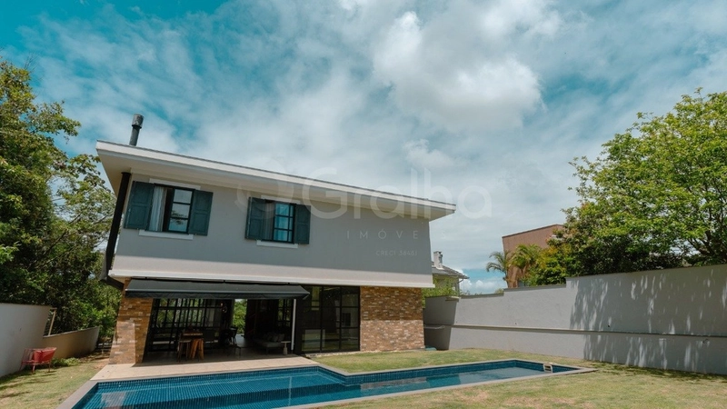 Casa  em condomínio fechado em Cacupé com 4 suítes e 4 vagas: 8ª foto da galeria de imagens do imóvel