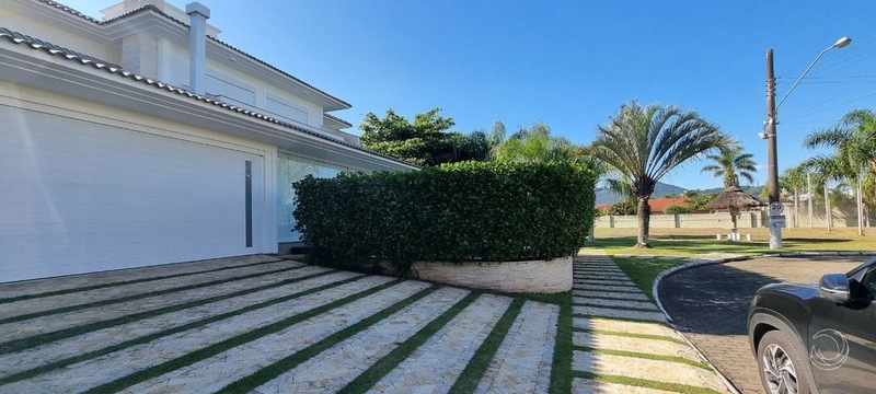 Casa em Condomínio fechado em Cacupé com 3 dormitórios 1 suíte e 2 vg: 53ª foto da galeria de imagens do imóvel