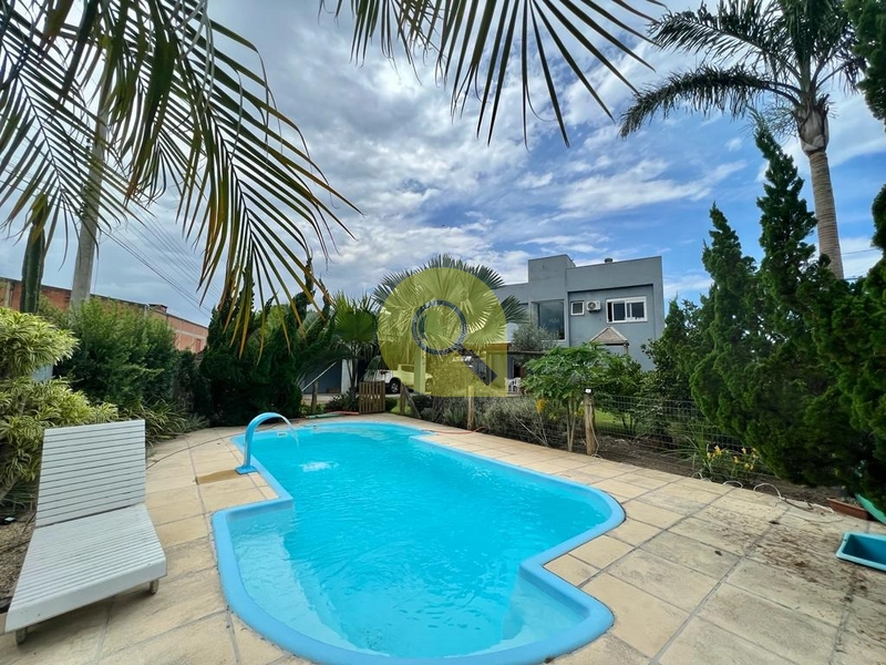 Residência 4 suítes, com amplo pátio com piscina, em Xangri-Lá!: 1ª foto da galeria de imagens do imóvel