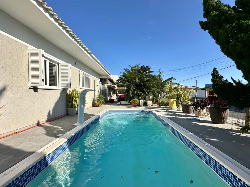 Residência de esquina, 3 dormitórios, com piscina, em Capão da Canoa!: 23ª foto da galeria de imagens do imóvel