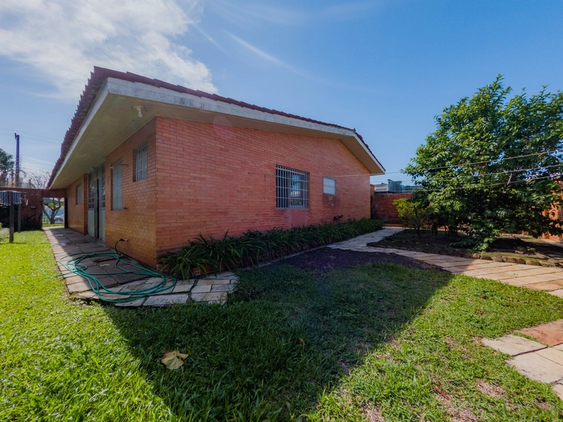 Casa plana, 4 dormitórios, com amplo terreno, em Atlântida!: 10ª foto da galeria de imagens do imóvel