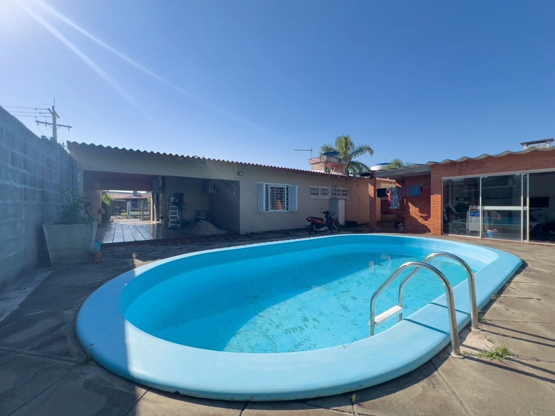 Casa 3 dormitórios, com piscina, em amplo terreno, em Atlântida!: 22ª foto da galeria de imagens do imóvel