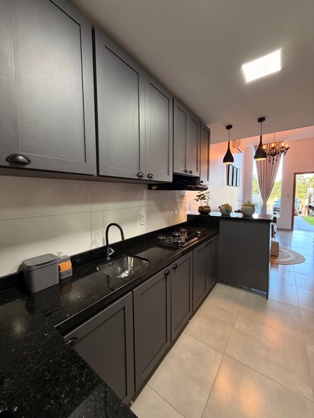 Casa com 3 dormitórios e piscina: 7ª foto da galeria de imagens do imóvel