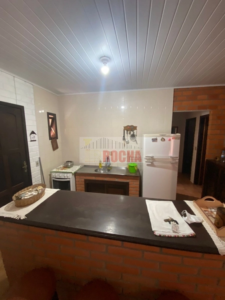 Linda casa a meia quadra do mar!: 9ª foto da galeria de imagens do imóvel
