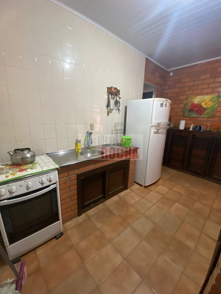 Linda casa a meia quadra do mar!: 16ª foto da galeria de imagens do imóvel