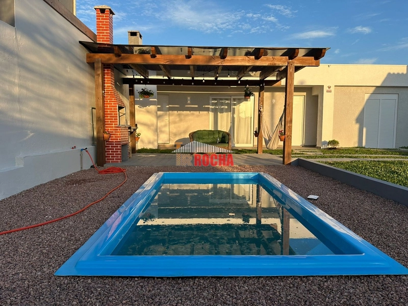 CASA COM PISCINA EM PRAIA DE ARROIO TEIXEIRA!: 1ª foto da galeria de imagens do imóvel