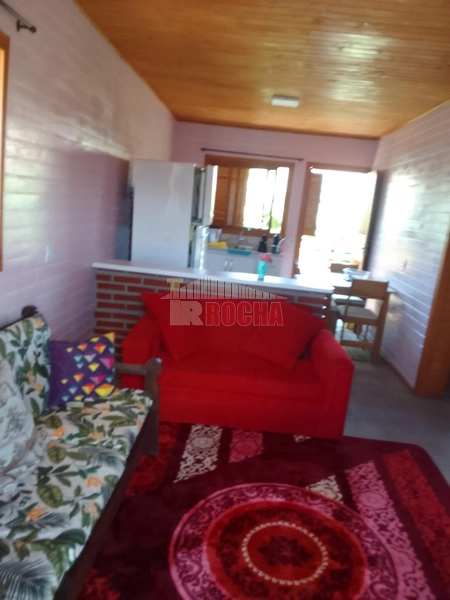 Linda casa a poucos metros do mar: 3ª foto da galeria de imagens do imóvel