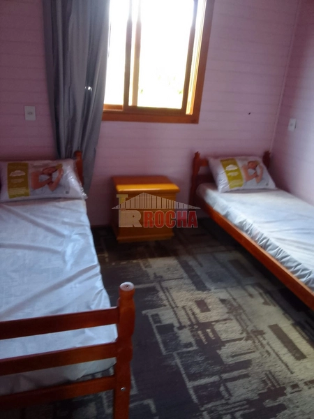 Linda casa a poucos metros do mar: 6ª foto da galeria de imagens do imóvel