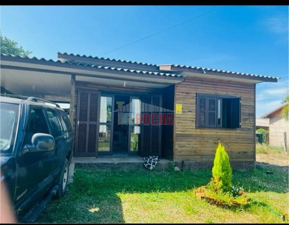 CASA DE MADEIRA EM PRAIA ARROIO TEIXEIRA!