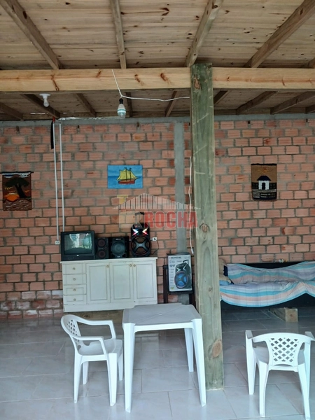 EXCLUSIVIDADE!  CASA COM AMPLO TERRENO EM PRAIA ARROIO TEIXEIRA!: 32ª foto da galeria de imagens do imóvel