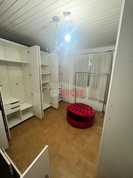 CASA COM AMPLO TERRENO DE ESQUINA EM PRAIA DE ARROIO TEIXEIRA: 15ª foto da galeria de imagens do imóvel