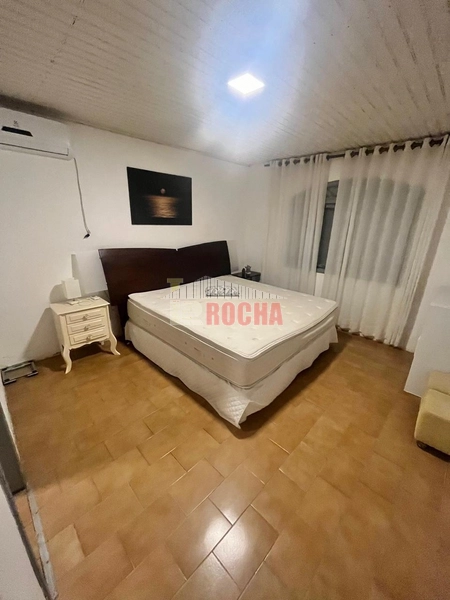 CASA COM AMPLO TERRENO DE ESQUINA EM PRAIA DE ARROIO TEIXEIRA: 20ª foto da galeria de imagens do imóvel