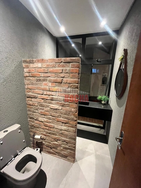 CASA COM AMPLO TERRENO DE ESQUINA EM PRAIA DE ARROIO TEIXEIRA: 16ª foto da galeria de imagens do imóvel