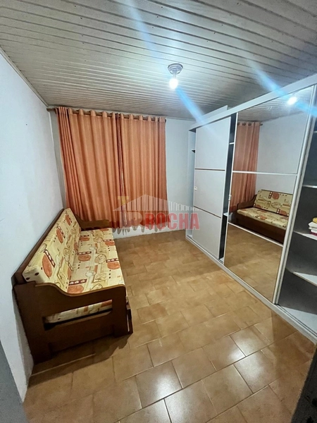 CASA COM AMPLO TERRENO DE ESQUINA EM PRAIA DE ARROIO TEIXEIRA: 12ª foto da galeria de imagens do imóvel