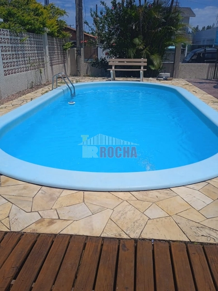 LINDA CASA A POUCOS METROS DO MAR EM PRAIA ARROIO TEIXEIRA!: 5ª foto da galeria de imagens do imóvel